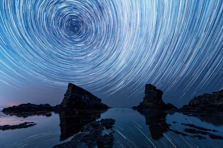 Star trails over the rock phenomenon The Ships (Bulgaria)