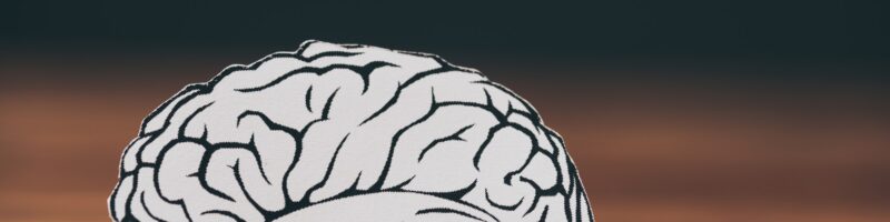 close up of paper with brain shape as dementia symbol