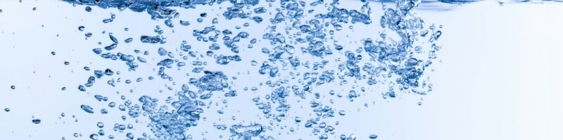 Water pours on white background