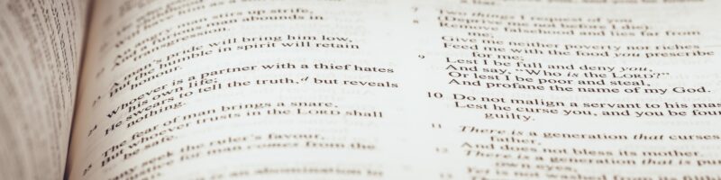 The Holy Bible on a wooden table